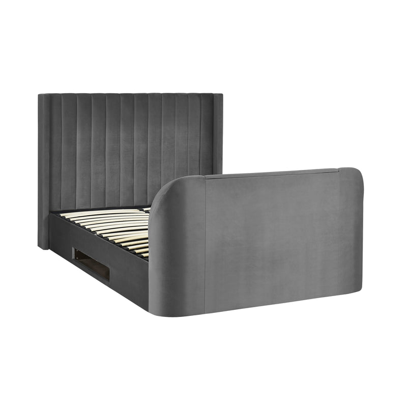 Gray upholstered bed with white bedding on a white background