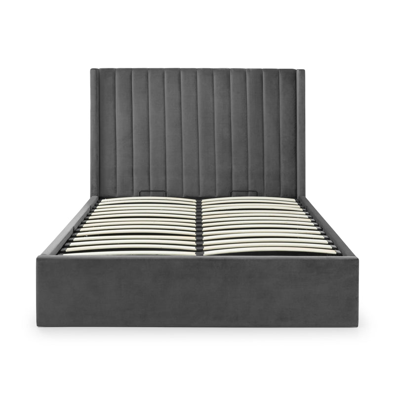 Dark gray upholstered bed frame on a white background