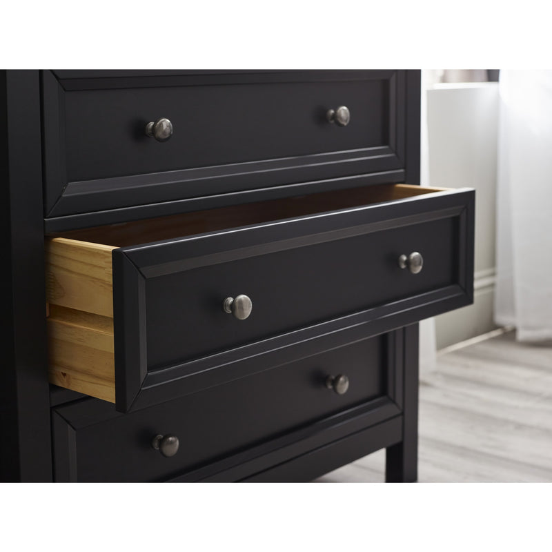 Black dresser with open drawer in a room setting