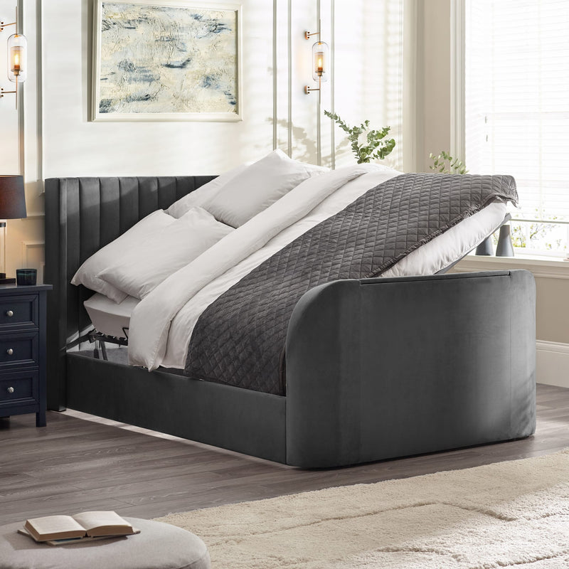 Modern bedroom with a gray upholstered bed, white bedding, and decorative elements.