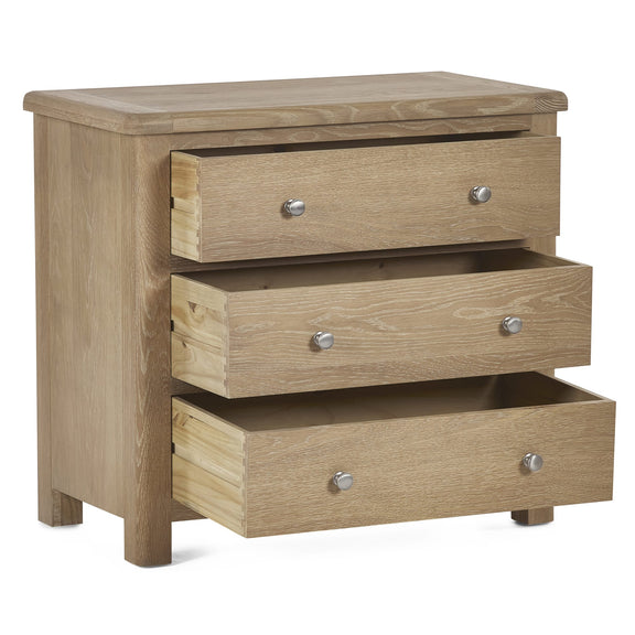 Wooden dresser with three drawers on a white background