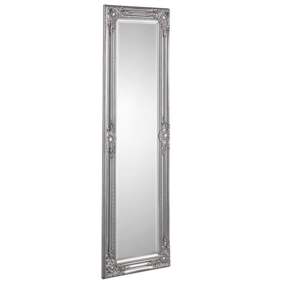 Silver ornate full-length mirror on a white background