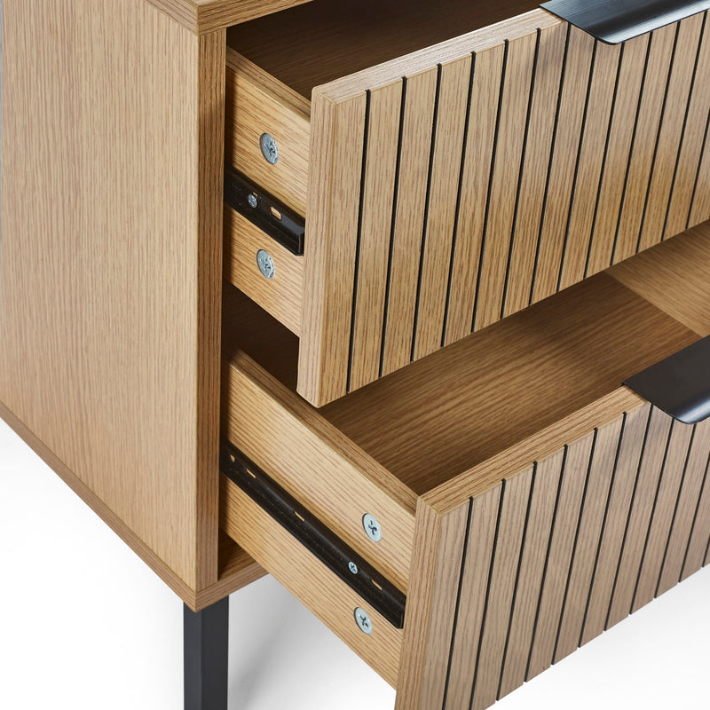 Wooden cabinet with open drawers on a white background