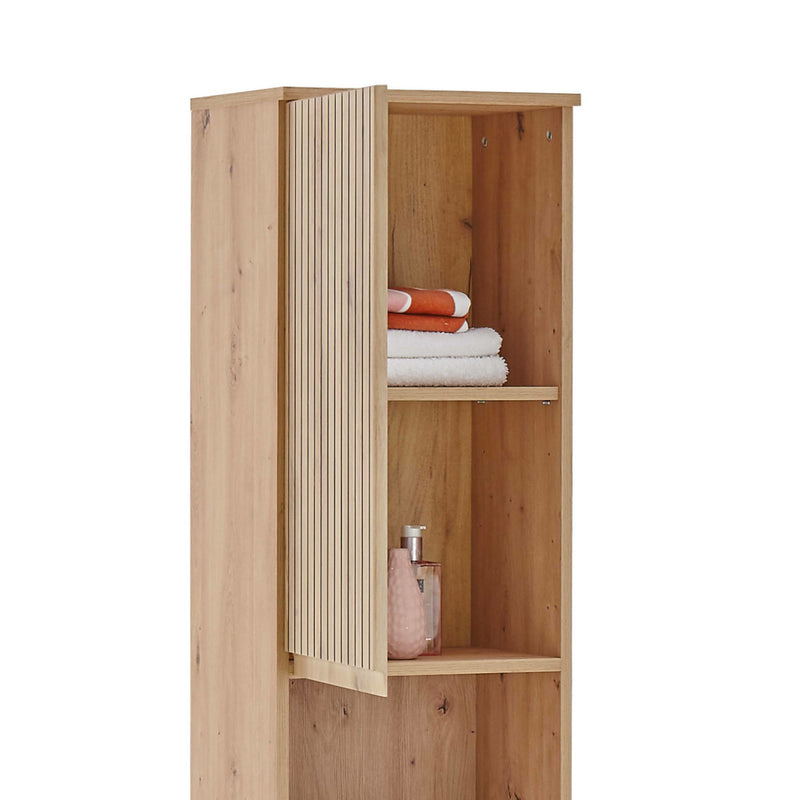 Wooden wardrobe with folded clothes inside on a white background