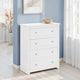 White dresser with four drawers against a blue wall in a room with natural light.