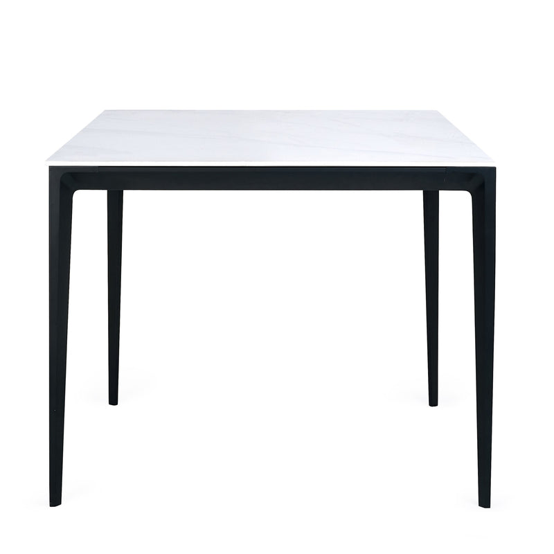 Square table with black frame and white top on a white background