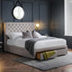 Modern bedroom with a gray upholstered bed and open drawer.