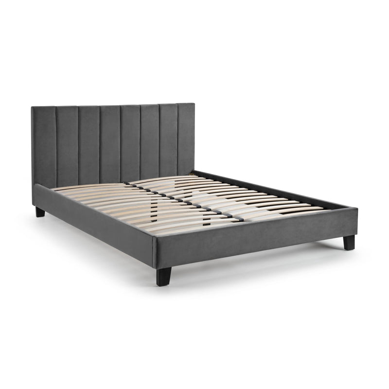 Gray upholstered bed with dimensions on a white background