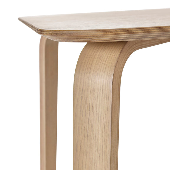 Wooden table with curved legs on a white background