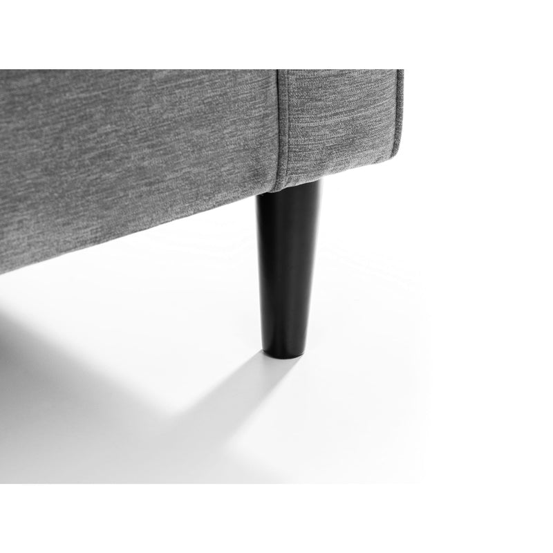 Gray upholstered bed frame with black legs on a white background