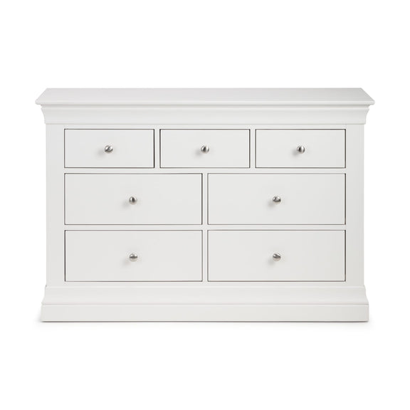 White dresser with multiple drawers on a white background