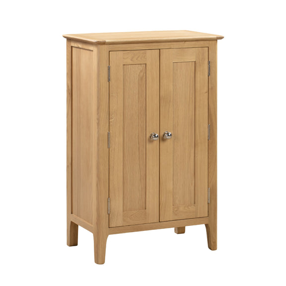 Wooden cabinet with two doors on a white background