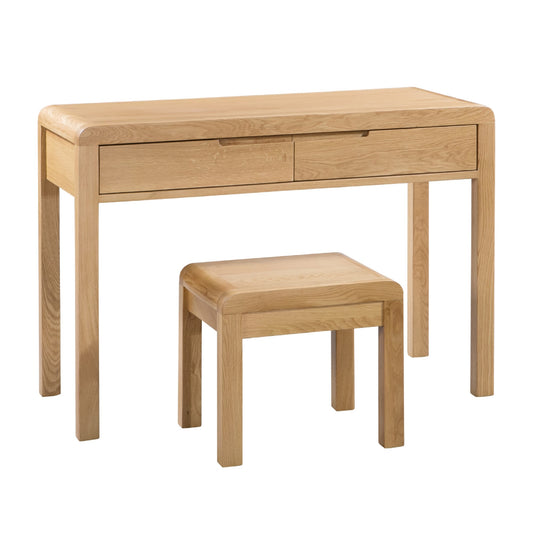 Wooden desk with two drawers and a matching stool on a white background