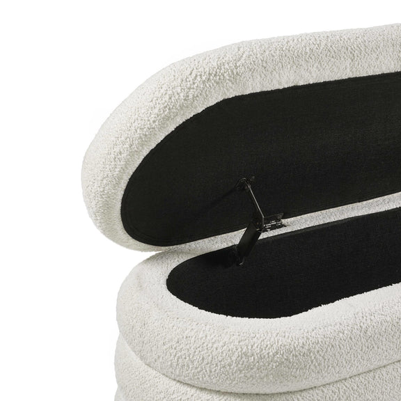 Close-up of a white and black shoe with a zipper on a white background