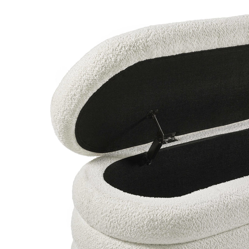 Close-up of a white and black shoe with a zipper on a white background