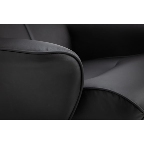 Close-up of a dark gray sofa with a soft texture.