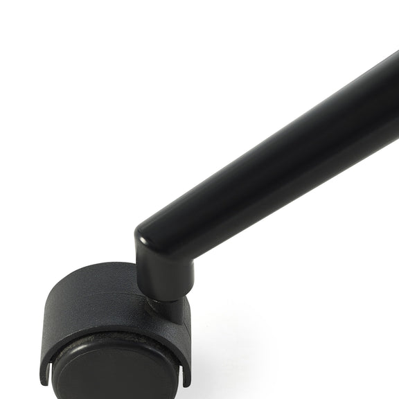 Black metal arm and caster wheel on a white background