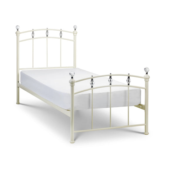 Cream-colored metal bed frame on a white background