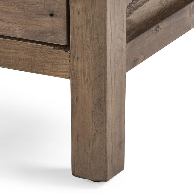Close-up of a wooden corner with a rustic finish on a white background