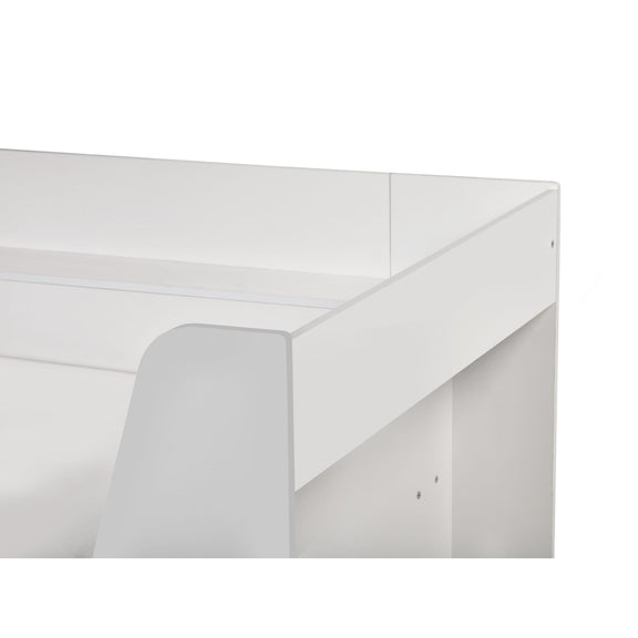 White rectangular object with a clear plastic cover on a white background