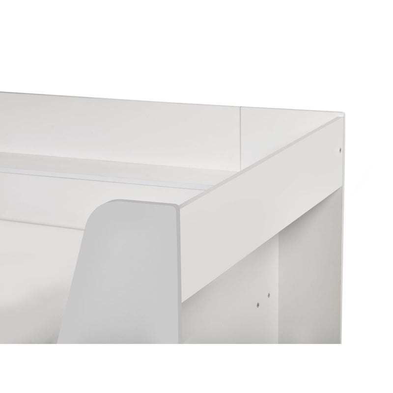 White rectangular object with a clear plastic cover on a white background