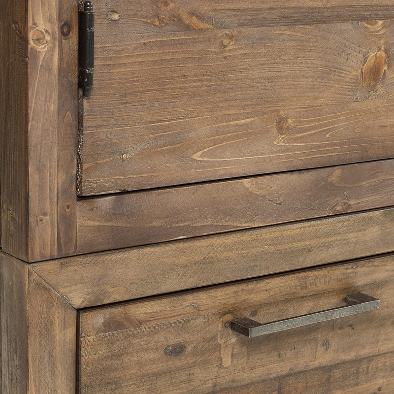 Close-up of a wooden cabinet with a metal handle