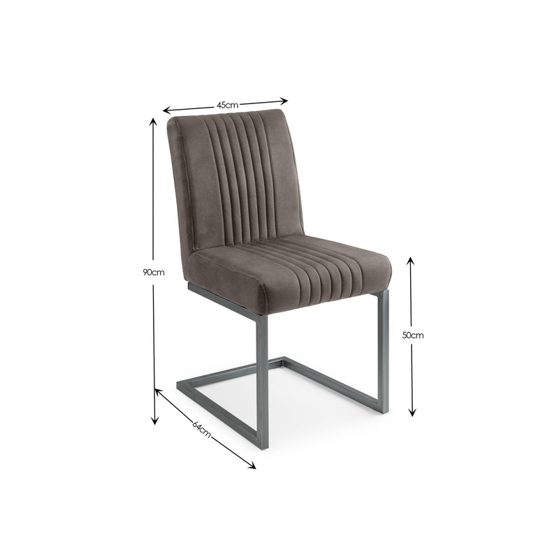 Gray upholstered chair with black legs on a white background