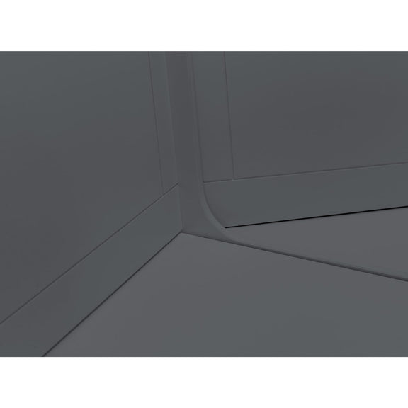 Gray corner of a room with a white wall.
