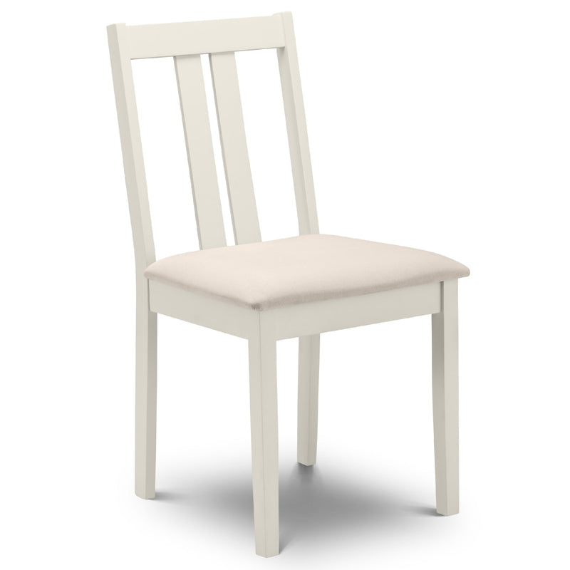 White chair with a cream cushion on a white background