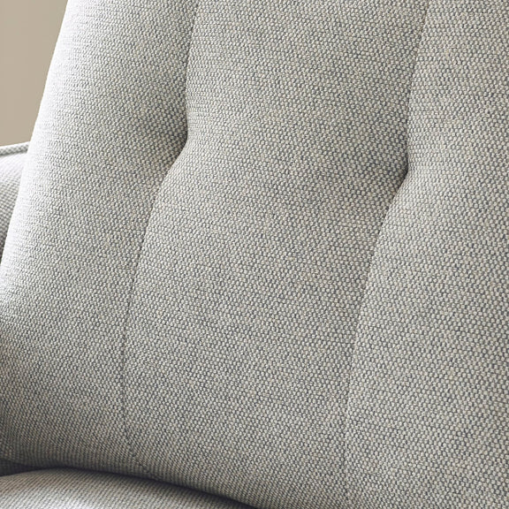 Close-up of a textured gray fabric surface