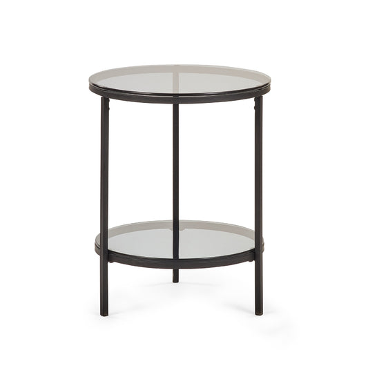 Round side table with glass top and black metal frame on a white background