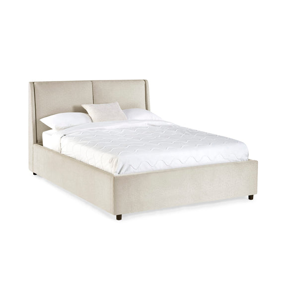 Beige upholstered bed with white mattress on a white background