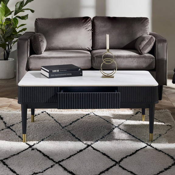 Gray sofa with a coffee table in a living room setting