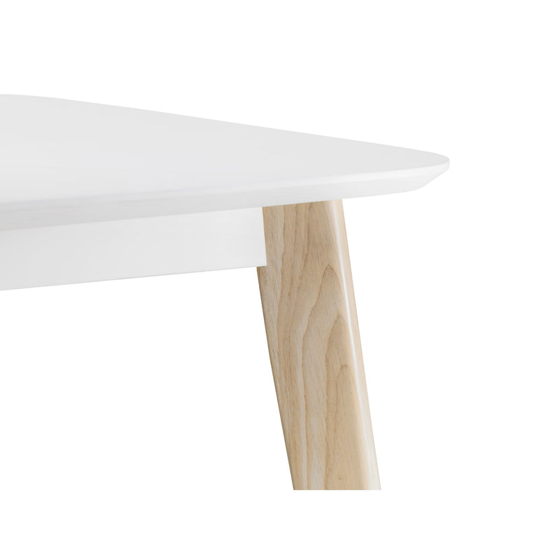 Round white table with wooden legs on a white background