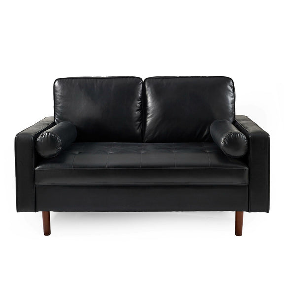 Black leather sofa on a white background
