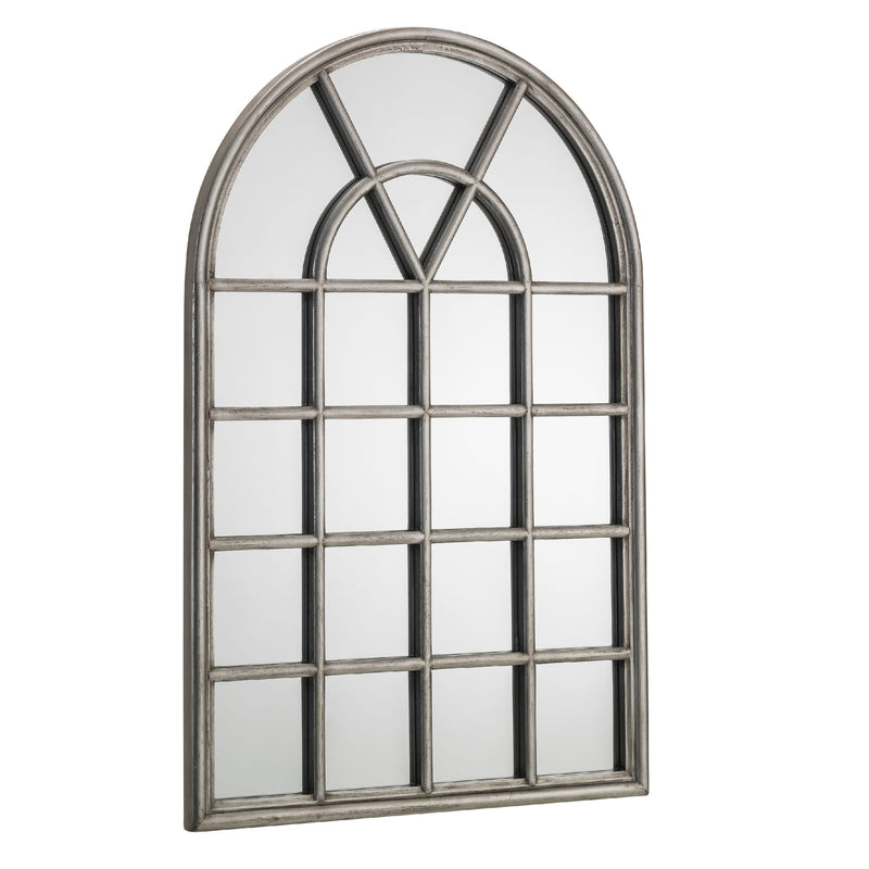 Decorative wall mirror with arched top and grid design on a white background
