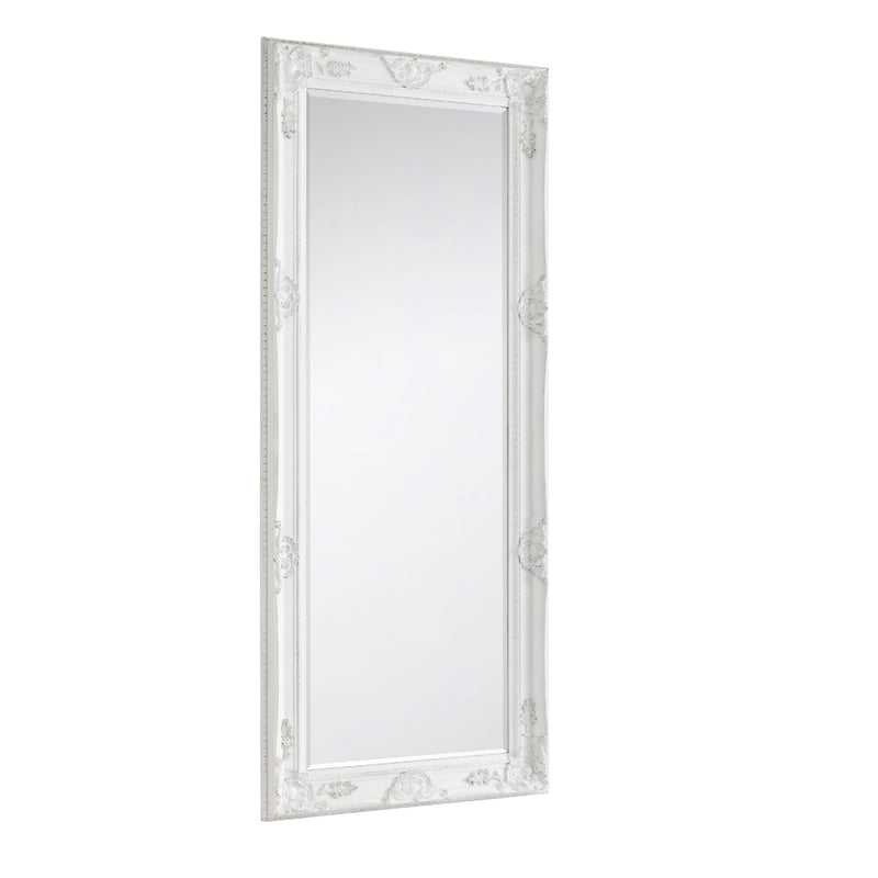 Rectangular mirror with decorative white frame on a white background