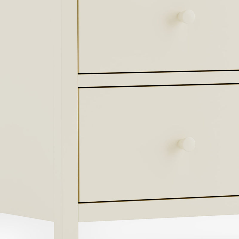 Close-up of a white cabinet with gold trim on a white background