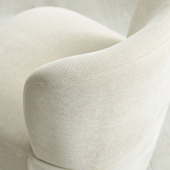Close-up of a textured beige fabric surface