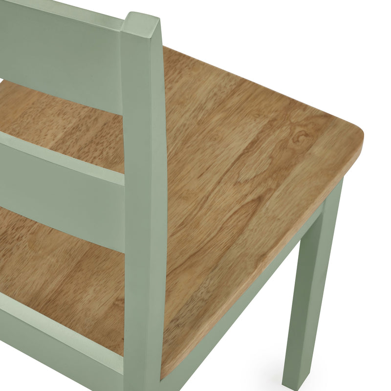 Wooden table with green frame on a white background