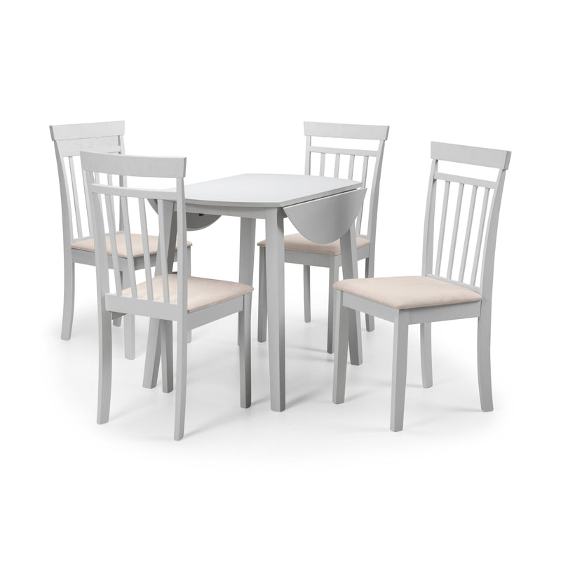 Gray dining table with four matching chairs on a white background