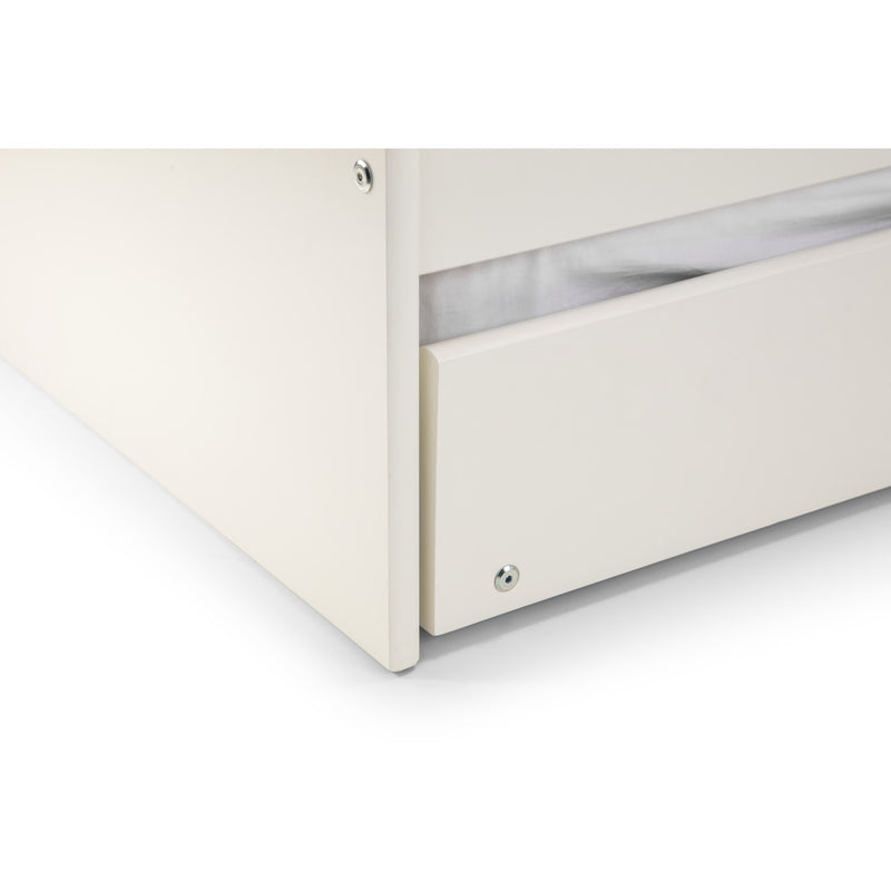 Close-up of a white drawer with a metallic handle on a white background
