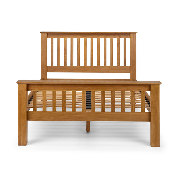 Wooden bed frame on a white background