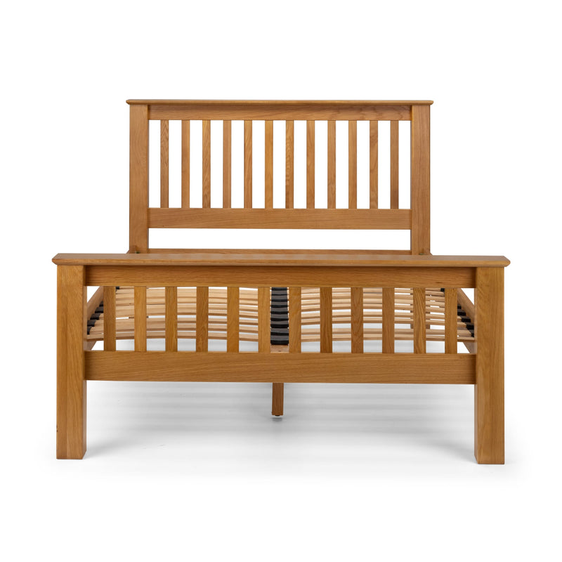 Wooden bed frame on a white background