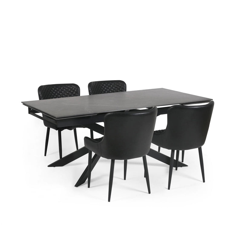 Black dining table with four matching chairs on a white background