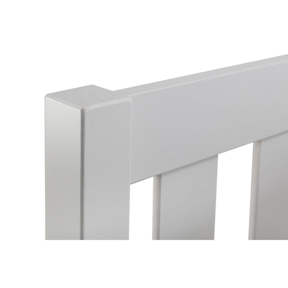 Close-up of a white wooden fence corner on a white background