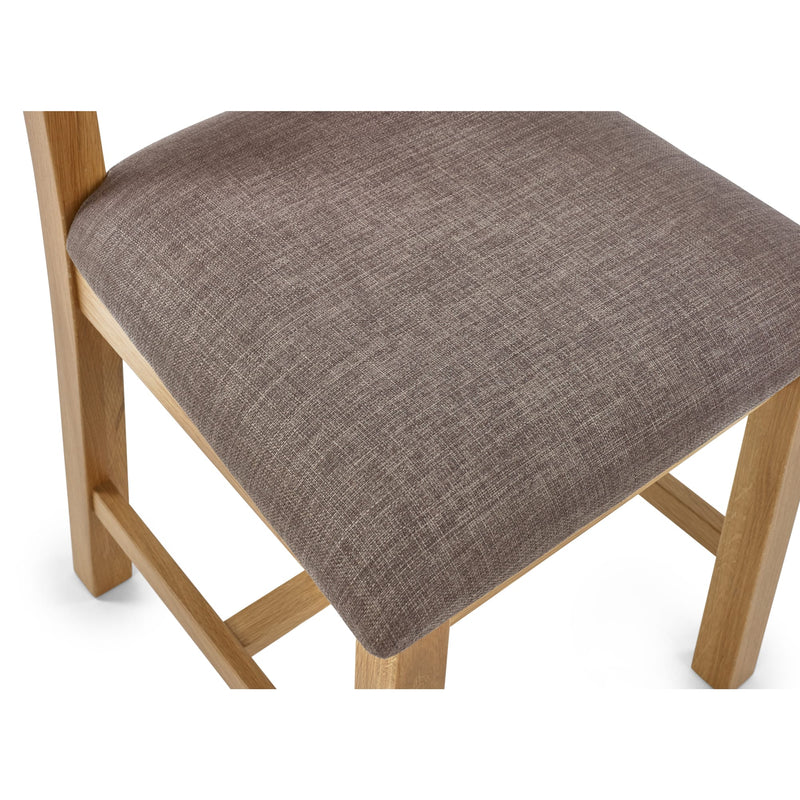 Chair with a brown upholstered seat on a white background