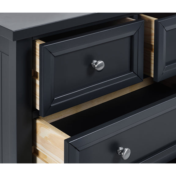 Black dresser with open drawer showing wooden interior