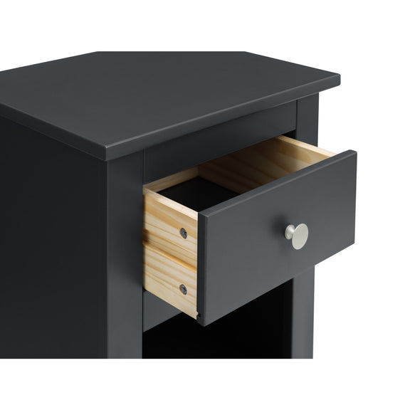 Black nightstand with a wooden drawer on a white background