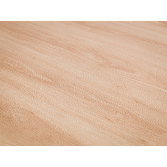 Close-up of a light wood surface with a clear finish